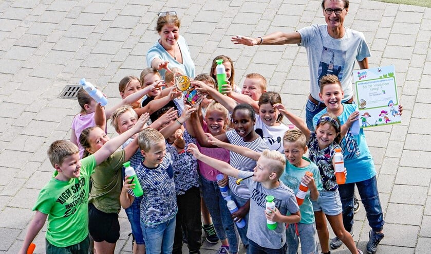 Blije gezichten in groep 5.