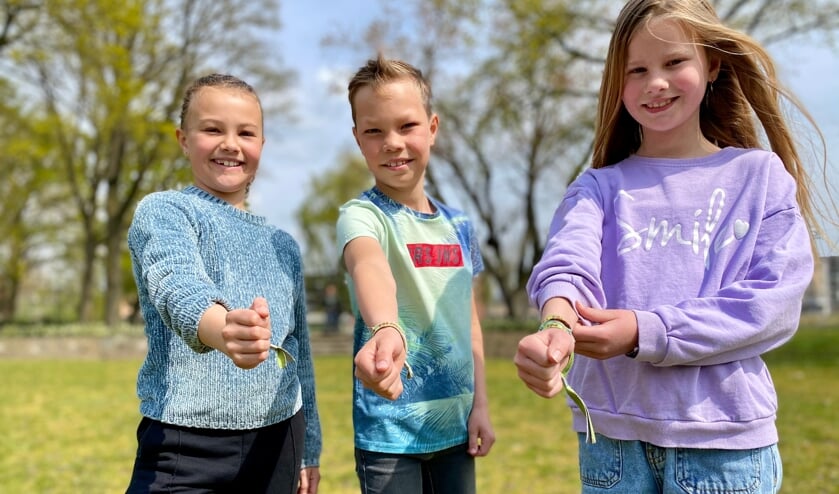 <p>Elin, Jasper en Lone hebben hun Veghel in Hout bandjes nog van voorgaande edities.</p>