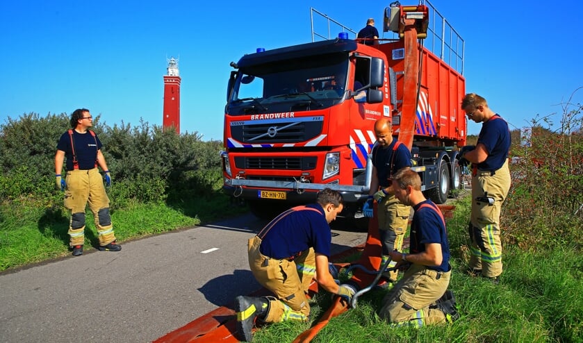Een Ridderkerkse brandweerploeg in Ouddorp
