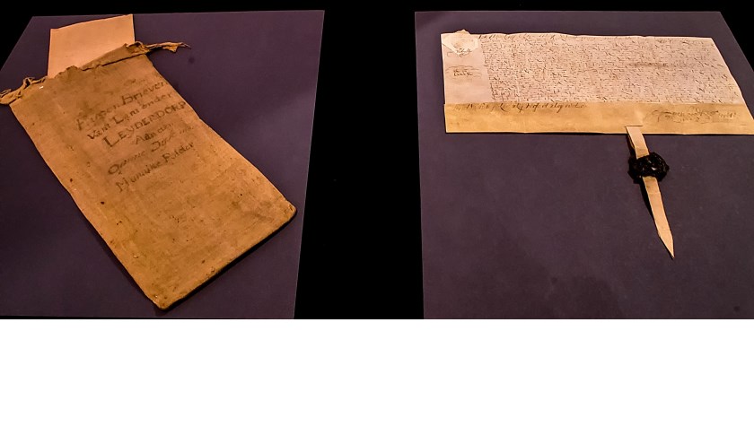 Een koopakte van een grondtransactie uit 1667. Links het linnen zakje waar het zogeheten charter in zat.
